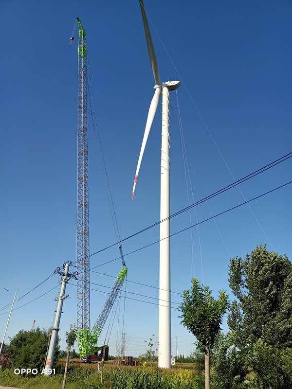 重機公司承建的大唐陽(yáng)信風(fēng)電工程首臺風(fēng)機安裝順利完成.jpg